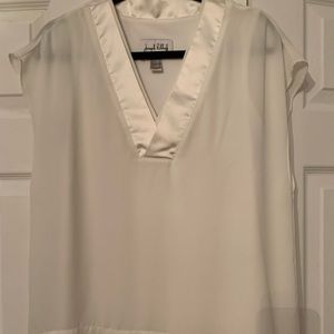 Sleeveless white blouse